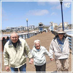 Pacifica residents stroll on the boardwalk