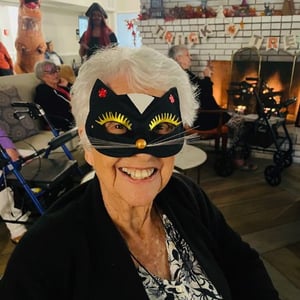 resident of senior living dressed as a cat for halloween