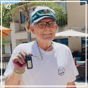 a pacifica resident shows off his step counter after a long walk