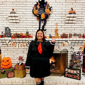 a senior living staff remember dressed for halloween