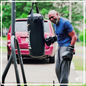 pacifica senior living resident stays fit by boxing