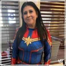Pacifica Menifee stssfff member dressed as a superhero for halloween
