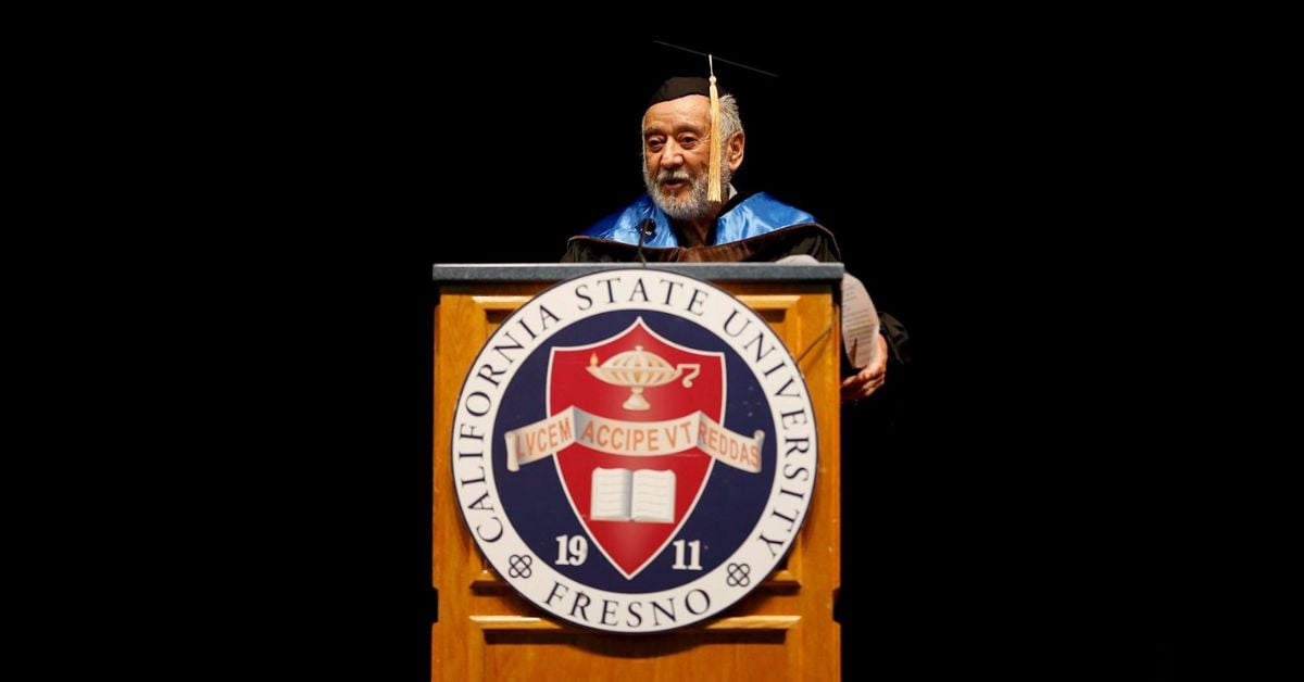 Ernesto palomino gives a speech at his doctorate ceremony